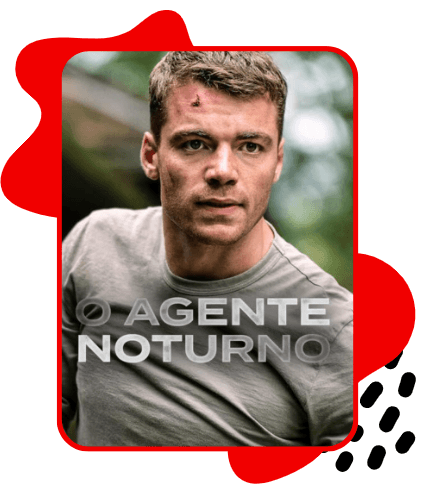 Pôster da série The Night Agent (O Agente Noturno), mostrando um homem com expressão séria e um pequeno ferimento na testa, vestindo camiseta cinza, em um cenário externo com fundo desfocado. O título “O Agente Noturno” aparece sobreposto na parte inferior da imagem.